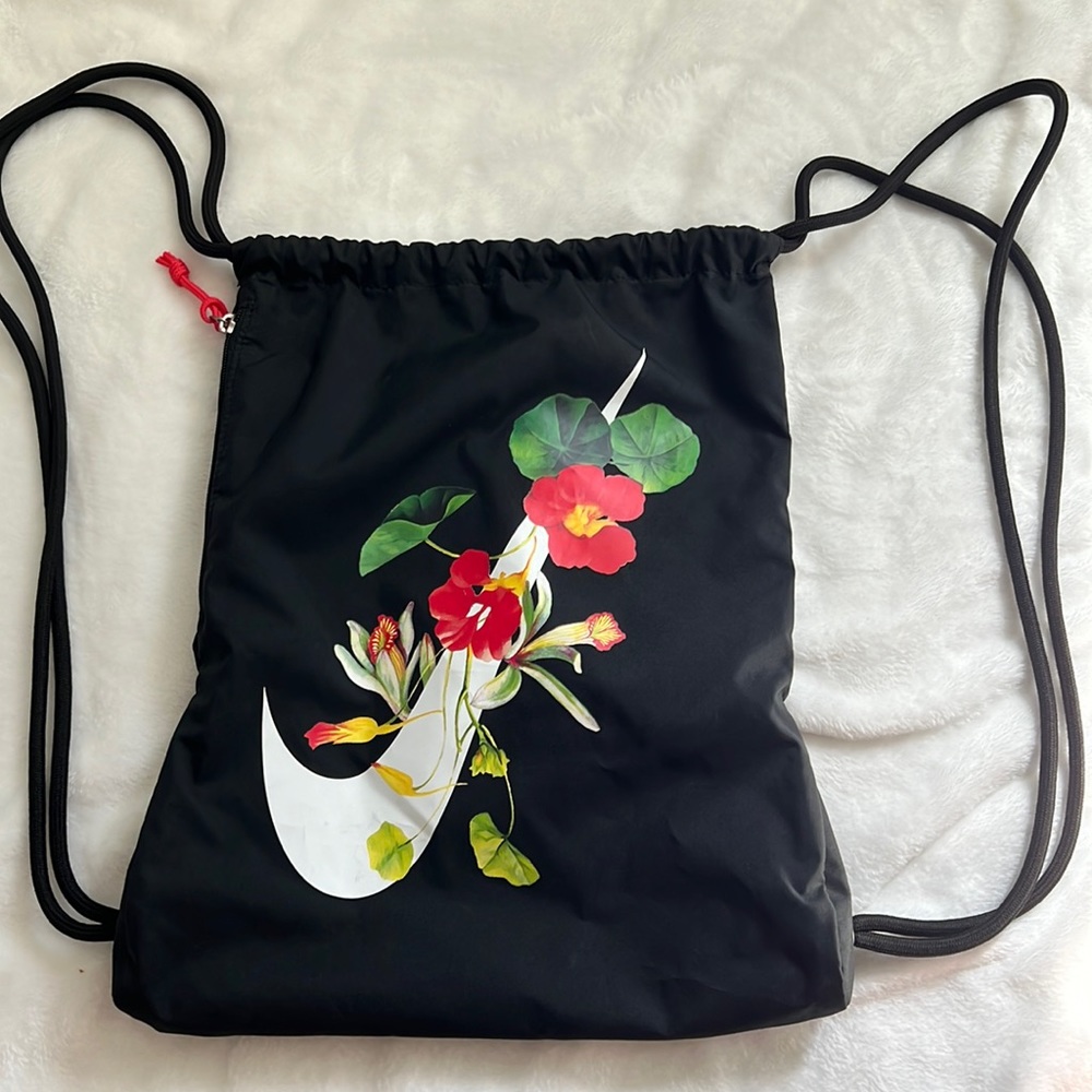 Nike | Floral drawstring backpack with side zipper.  Super cute